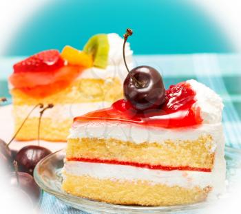 Delicious Cream Cakes Showing Cherries Sliced And Cafeterias