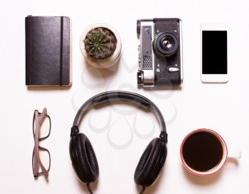 set,collage of men's, women's accessories.Collage of men's, women's accessories on white background. Phone,headphones,camera vintage, notebook, glasses,coffee. Creative concept, creative, human, hipst