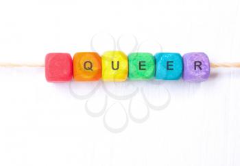 word queer rainbow of colors cubes.Concept  LGBT.Rainbow flag.