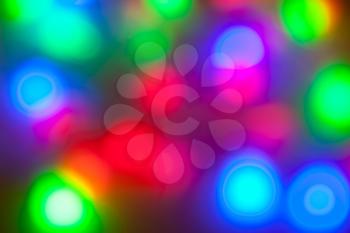 colorful garlands of lights out of focus. New Year, Christmas background