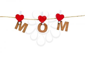 wood letters and heart forming mom on  white  background,isolate