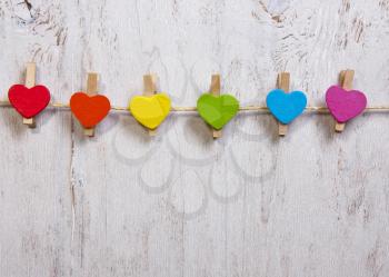 heart rainbow of colors on a white wooden background,LGBT symbol