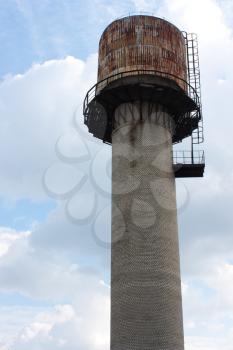 old  rusty water Soviet tower.hydraulic engineering construction in the water supply