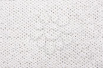 White  knitted texture. Wool jersey background