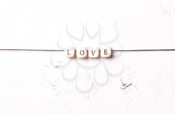 The word Love from cubes on a white background.concept Valentine's Day