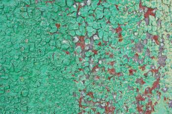 Green rusty background, rough, rough texture in the cracks. Corrosion of metal iron. The Army, the city banner, billboard