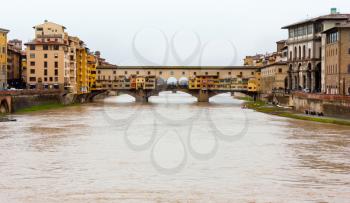 Florence, Italy. River Arno and famous bridge Ponte Vecchio  (Italian: Firenze, Toscana).