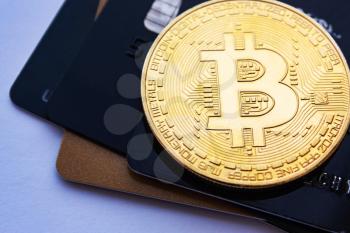 Coin bitcoin and credit cards. The concept of crypto currency, money online