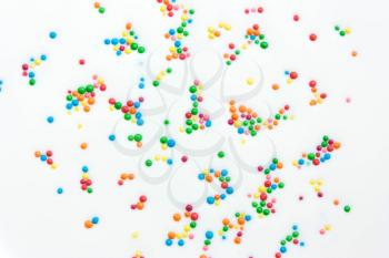 Abstract background from milk white with colored balls