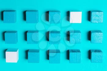 Geometric, abstract creative background of blue and white cubes. Problem solving concept, logical thinking, leader