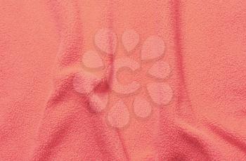 coral soft fleece texture. The surface of a teddy crumpled microfiber rug