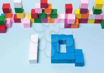 word IQ from multi-colored cubes. The concept of logical thinking, development, mind