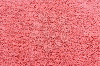 coral soft fleece texture. The surface of a teddy microfiber rug