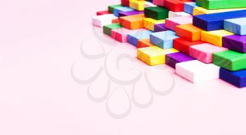 Concept creative, logical thinking, art,Creativity inspiration, order, business organization. Colored dominoes on a pink background