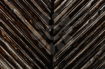 Old oak dark brown grunge natural vintage wooden background.Diagonal boards.
