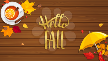 Hello Fall lettering on wooden background with tea, umbrella and autumn leaves. Vector illustration.