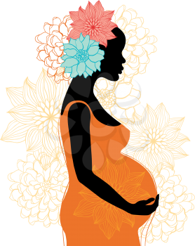 Silhouette of pregnant woman with flowers.