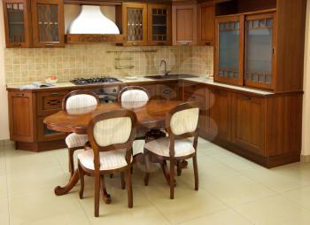 Wooden and brown kitchen. Indoor design.