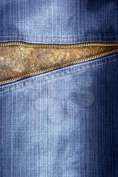 Texture of jeans with zipper. Element of design.