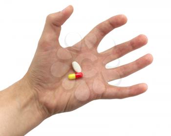 Tense hand with pills. Element of medical design.