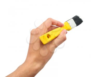 Hand with yellow brush. Element of design.
