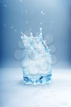 Water splash in glass. Element of design.