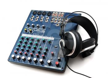 Mixing console and headphones. Element of music design.