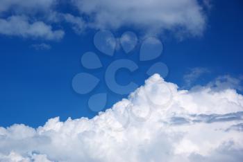 Big clouds in blue sky. Nature composition.