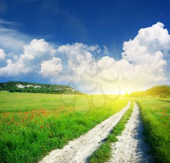 Lane in meadow and deep blue sky. Nature design. 