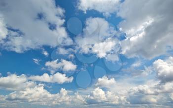 Deep blue sky and clouds. Nature airscape.