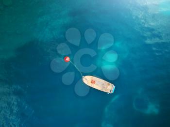 Boat. Aerial view of boat in sea. Beautiful summer seascape with ships, clear azure water at sunny day. Top view.