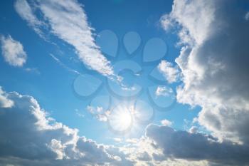 Sun shines in blue sky and beautiful cloud. Nature scene composition.