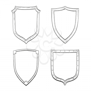Set of vintage shields. Hand drawn vector illustration. Isolated on white background.