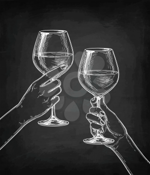 Two hands clinking glasses of wine. Chalk sketch on blackboard background. Hand drawn vector illustration. Retro style.