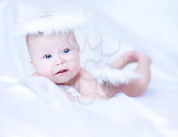Adorable angel baby, close-up portrait