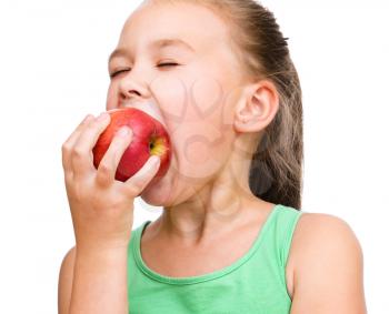Portrait of a cute cheerful little girl with red apple, isolated over white