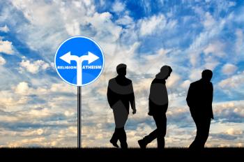 Atheism. Three men Atheists have chosen the direction of atheism near the road sign