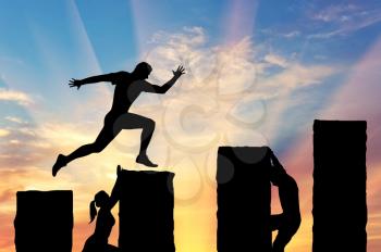 Business risks and competition concept. Running businessman jumps over precipices and competitors