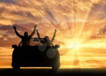 Travel and freedom. Happy people in the car meet the sunset