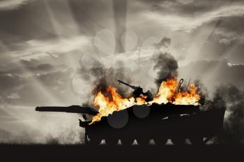 Concept of war and conflict. Military tank in the fire and smoke