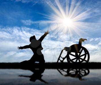 Concept of disability and positive. Silhouette happy disabled on a sky background and reflected in water