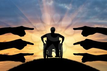 Discrimination against the disabled. Silhouette of hands, denouncing show on the disabled in the chair wheelchair