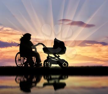 Disabled woman in wheelchair holding stroller sunset and reflection in water. Concept disabled and family