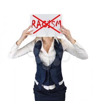 Racism and discrimination concept. A woman holds a poster with the word crossed out racism