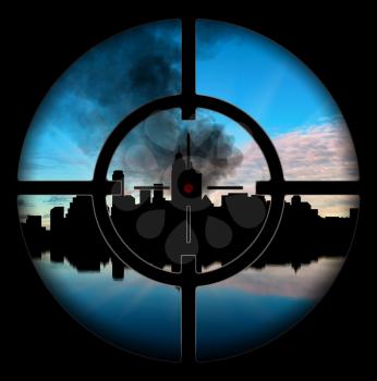 Concept of terrorism. Silhouette of city under the gun in a smoke on a background of dawn