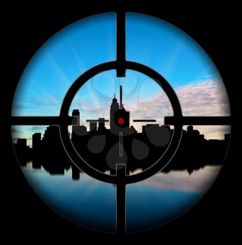 ?oncept of terrorism. Silhouette of the city at gunpoint on a background of dawn