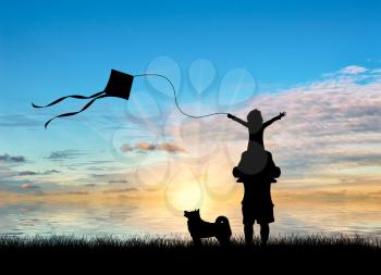Young dad with child and dog playing with kite near sea. Concept family