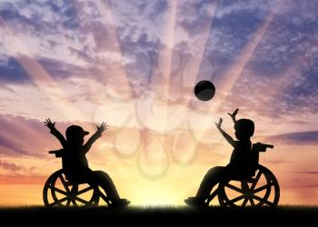 Happy children disabilities play ball sunset. Concept happy children disabilities