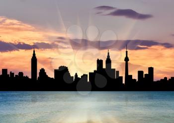 Silhouette of the beautiful scenery of the city against the backdrop of a beautiful sunset sea