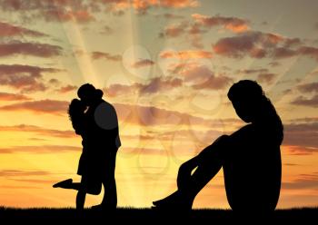Concept of betrayal and treason. Silhouette of a lonely woman looking at loving couple at sunset